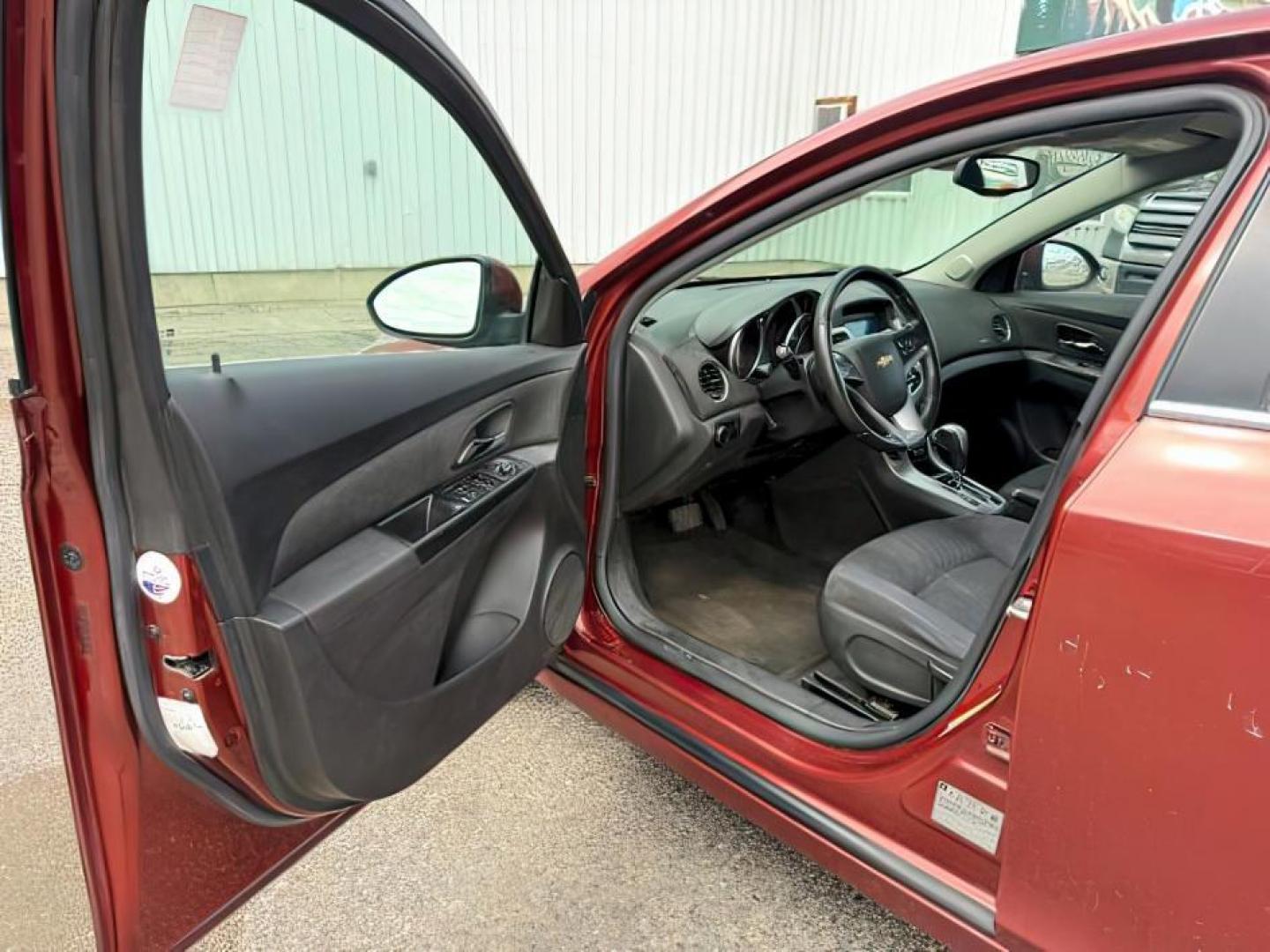 2013 COPPER /Jet Black Chevrolet Cruze (1G1PC5SB6D7) with an ECOTEC 14L I-4 DOHC engine, Automatic transmission, located at 1175 N Woodruff Ave, Idaho Falls, ID, 83401, 43.506901, -111.999657 - At Timberline Auto, finding a great deal on your next vehicle is always easy! Our experienced sales staff's goal is to help find you the right vehicle at the right price! Our knowledgeable finance department has options for almost any credit score. We offer extended service contract options to prote - Photo#10