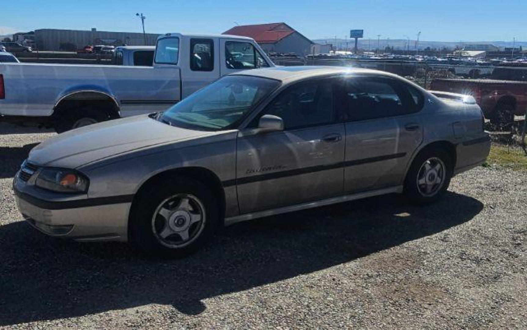 2001 GOLD /Neutral Chevrolet Impala (2G1WH55K919) with an 38L V-6 regular unleaded engine, Automatic transmission, located at 1175 N Woodruff Ave, Idaho Falls, ID, 83401, 43.506901, -111.999657 - At Timberline Auto, finding a great deal on your next vehicle is always easy! Our experienced sales staff's goal is to help find you the right vehicle at the right price! Our knowledgeable finance department has options for almost any credit score. We offer extended service contract options to prote - Photo#1
