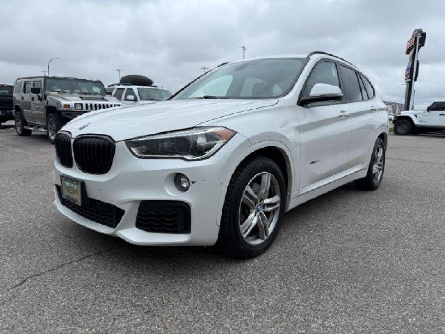 2016 WHITE /Black BMW X1 (WBXHT3C37G5) with an 2L I-4 gasoline direct injection engine, Automatic transmission, located at 1175 N Woodruff Ave, Idaho Falls, ID, 83401, 43.506901, -111.999657 - Photo#29