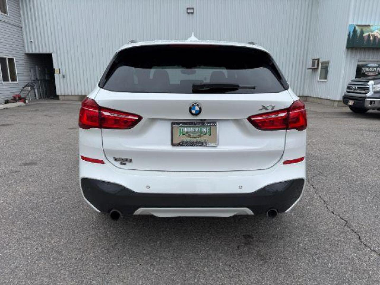 2016 WHITE /Black BMW X1 (WBXHT3C37G5) with an 2L I-4 gasoline direct injection engine, Automatic transmission, located at 1175 N Woodruff Ave, Idaho Falls, ID, 83401, 43.506901, -111.999657 - Photo#32