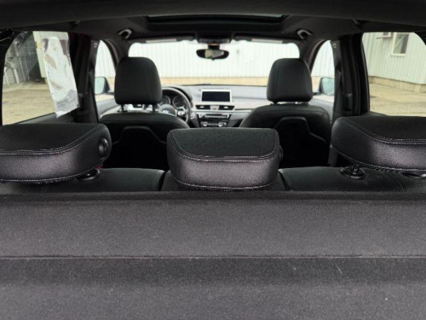 2016 WHITE /Black BMW X1 (WBXHT3C37G5) with an 2L I-4 gasoline direct injection engine, Automatic transmission, located at 1175 N Woodruff Ave, Idaho Falls, ID, 83401, 43.506901, -111.999657 - Photo#36