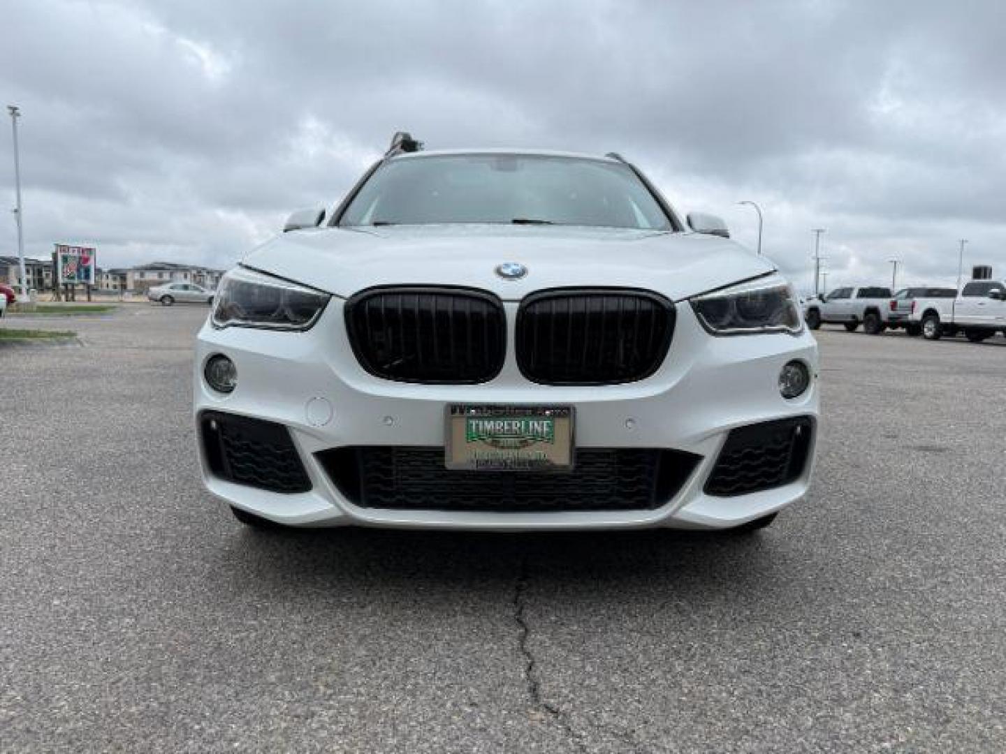 2016 WHITE /Black BMW X1 (WBXHT3C37G5) with an 2L I-4 gasoline direct injection engine, Automatic transmission, located at 1175 N Woodruff Ave, Idaho Falls, ID, 83401, 43.506901, -111.999657 - Photo#41