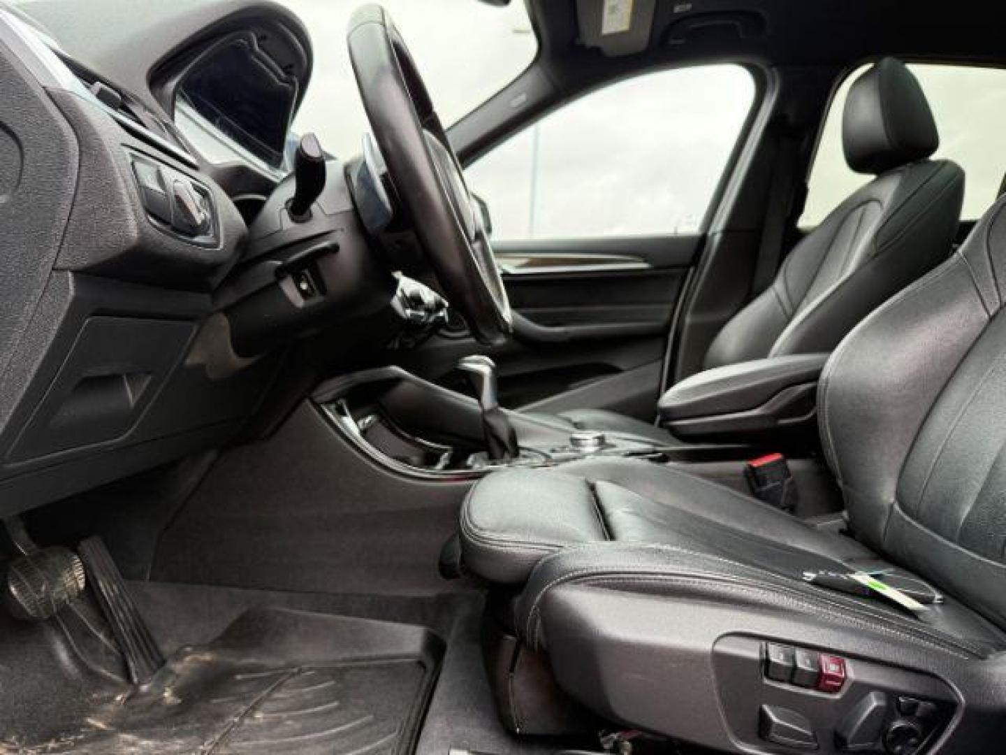 2016 WHITE /Black BMW X1 (WBXHT3C37G5) with an 2L I-4 gasoline direct injection engine, Automatic transmission, located at 1175 N Woodruff Ave, Idaho Falls, ID, 83401, 43.506901, -111.999657 - Photo#45