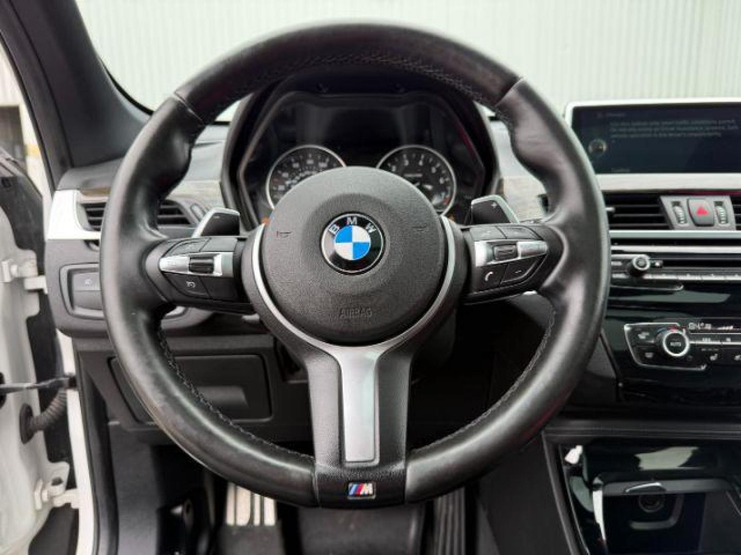 2016 WHITE /Black BMW X1 (WBXHT3C37G5) with an 2L I-4 gasoline direct injection engine, Automatic transmission, located at 1175 N Woodruff Ave, Idaho Falls, ID, 83401, 43.506901, -111.999657 - Photo#47