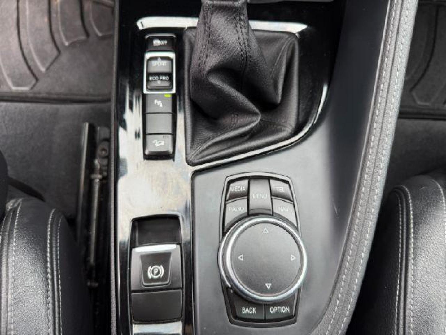 2016 WHITE /Black BMW X1 (WBXHT3C37G5) with an 2L I-4 gasoline direct injection engine, Automatic transmission, located at 1175 N Woodruff Ave, Idaho Falls, ID, 83401, 43.506901, -111.999657 - Photo#51