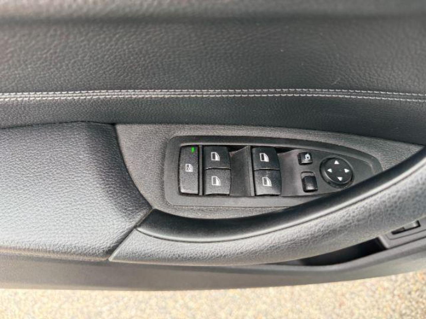 2016 WHITE /Black BMW X1 (WBXHT3C37G5) with an 2L I-4 gasoline direct injection engine, Automatic transmission, located at 1175 N Woodruff Ave, Idaho Falls, ID, 83401, 43.506901, -111.999657 - Photo#53