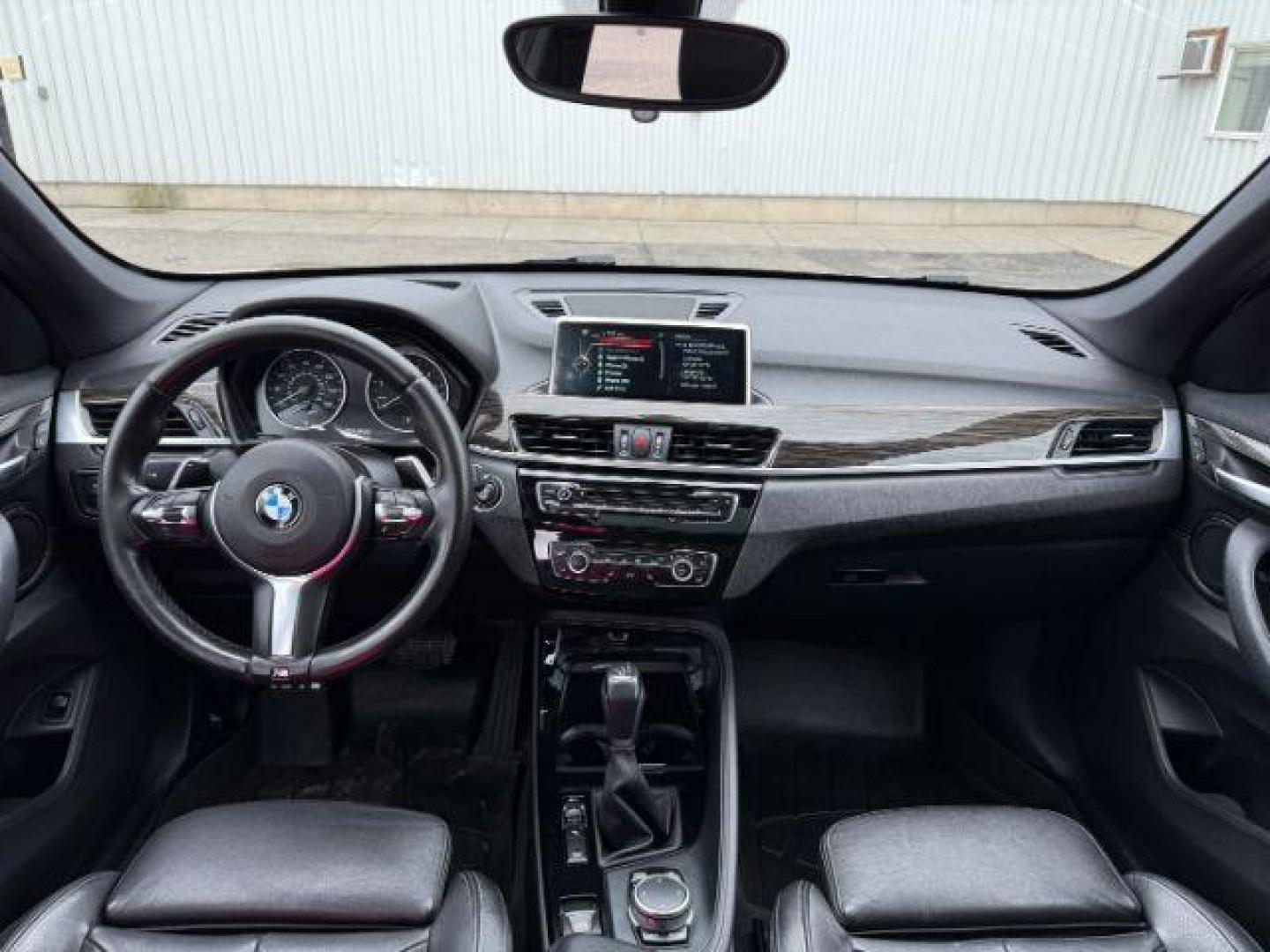 2016 WHITE /Black BMW X1 (WBXHT3C37G5) with an 2L I-4 gasoline direct injection engine, Automatic transmission, located at 1175 N Woodruff Ave, Idaho Falls, ID, 83401, 43.506901, -111.999657 - Photo#55