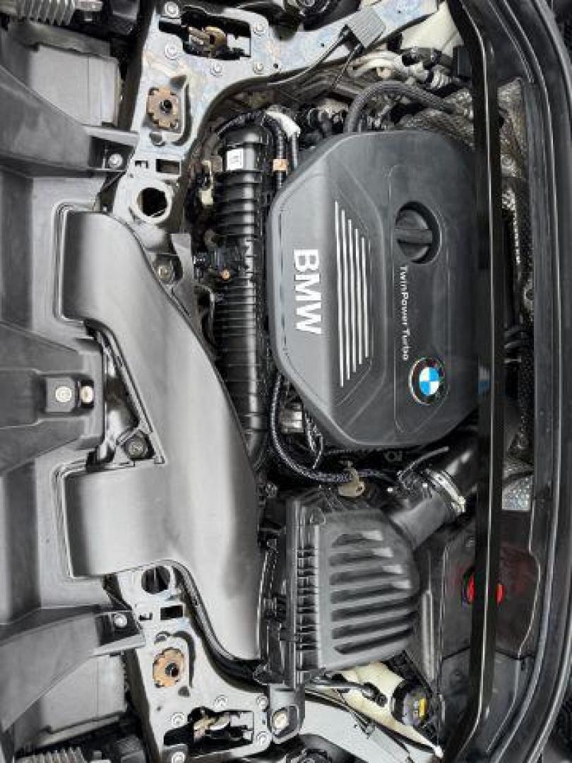 2016 WHITE /Black BMW X1 (WBXHT3C37G5) with an 2L I-4 gasoline direct injection engine, Automatic transmission, located at 1175 N Woodruff Ave, Idaho Falls, ID, 83401, 43.506901, -111.999657 - Photo#57