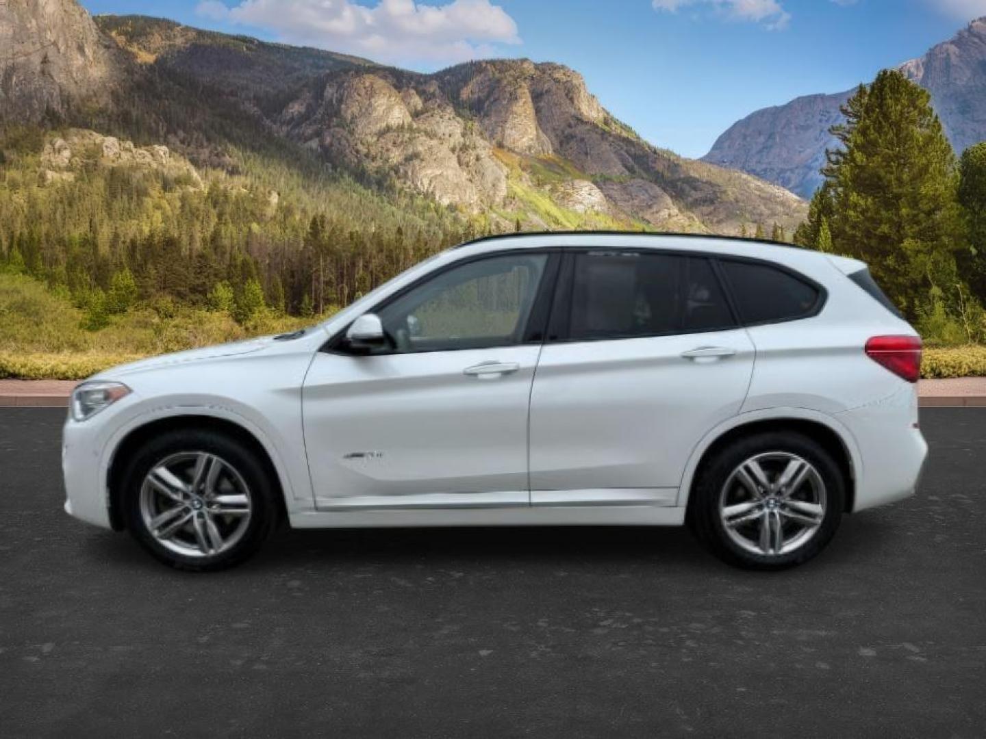 2016 WHITE /Black BMW X1 (WBXHT3C37G5) with an 2L I-4 gasoline direct injection engine, Automatic transmission, located at 1175 N Woodruff Ave, Idaho Falls, ID, 83401, 43.506901, -111.999657 - Photo#1