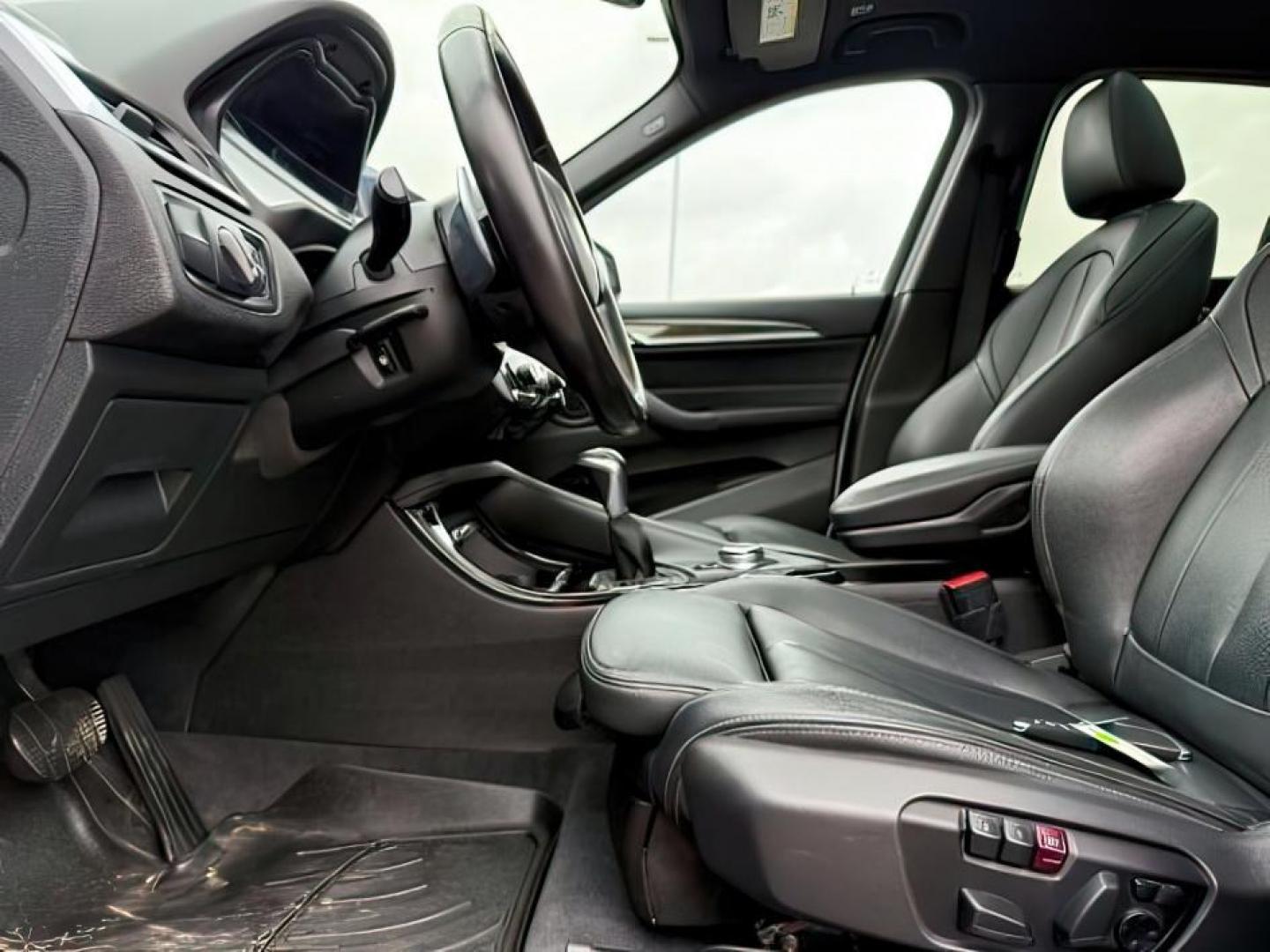 2016 WHITE /Black BMW X1 (WBXHT3C37G5) with an 2L I-4 gasoline direct injection engine, Automatic transmission, located at 1175 N Woodruff Ave, Idaho Falls, ID, 83401, 43.506901, -111.999657 - Photo#16