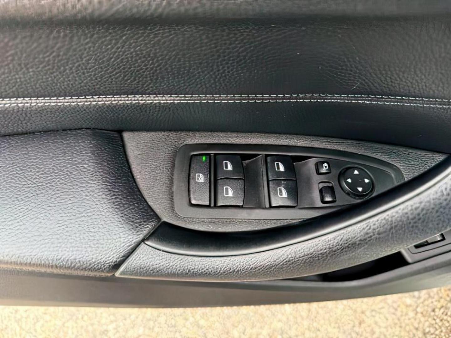 2016 WHITE /Black BMW X1 (WBXHT3C37G5) with an 2L I-4 gasoline direct injection engine, Automatic transmission, located at 1175 N Woodruff Ave, Idaho Falls, ID, 83401, 43.506901, -111.999657 - Photo#24