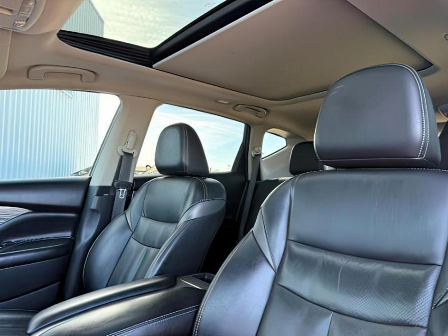 2018 GRAY /Graphite Nissan Murano (5N1AZ2MH0JN) with an 35L V-6 DOHC engine, Automatic transmission, located at 1175 N Woodruff Ave, Idaho Falls, ID, 83401, 43.506901, -111.999657 - At Timberline Auto, finding a great deal on your next vehicle is always easy! Our experienced sales staff's goal is to help find you the right vehicle at the right price! Our knowledgeable finance department has options for almost any credit score. We offer extended service contract options to prote - Photo#23