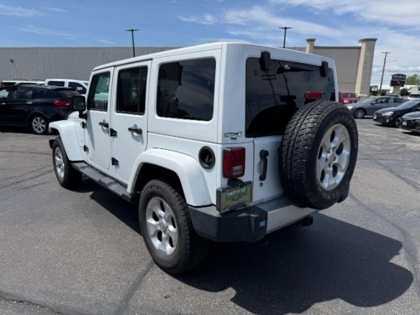 2015 Bright White /Black Jeep Wrangler Unlimited Sahara (1C4BJWEG9FL) with an Pentastar 3.6L V-6 DOHC engine, AUTOMATIC transmission, located at 1235 N Woodruff Ave., Idaho Falls, 83401, (208) 523-1053, 43.507172, -112.000488 - At Timberline Auto, finding a great deal on your next vehicle is always easy! Our experienced sales staff's goal is to help find you the right vehicle at the right price! Our knowledgeable finance department has options for almost any credit score. We offer extended service contract options to prote - Photo#27