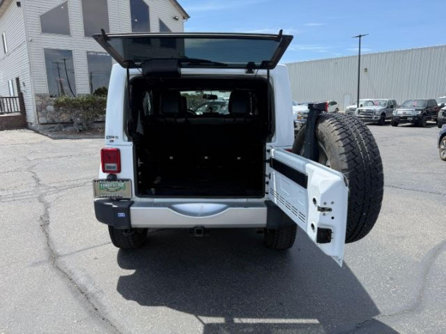 2015 Bright White /Black Jeep Wrangler Unlimited Sahara (1C4BJWEG9FL) with an Pentastar 3.6L V-6 DOHC engine, AUTOMATIC transmission, located at 1235 N Woodruff Ave., Idaho Falls, 83401, (208) 523-1053, 43.507172, -112.000488 - At Timberline Auto, finding a great deal on your next vehicle is always easy! Our experienced sales staff's goal is to help find you the right vehicle at the right price! Our knowledgeable finance department has options for almost any credit score. We offer extended service contract options to prote - Photo#29