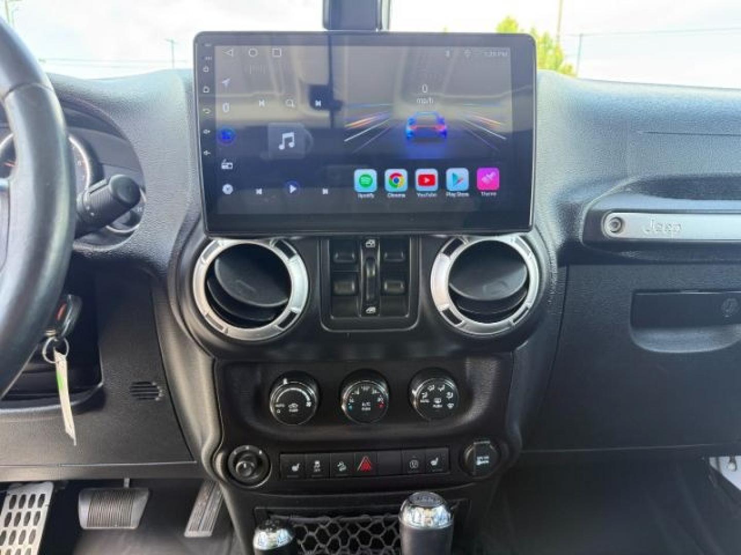 2015 Bright White /Black Jeep Wrangler Unlimited Sahara (1C4BJWEG9FL) with an Pentastar 3.6L V-6 DOHC engine, AUTOMATIC transmission, located at 1235 N Woodruff Ave., Idaho Falls, 83401, (208) 523-1053, 43.507172, -112.000488 - At Timberline Auto, finding a great deal on your next vehicle is always easy! Our experienced sales staff's goal is to help find you the right vehicle at the right price! Our knowledgeable finance department has options for almost any credit score. We offer extended service contract options to prote - Photo#40