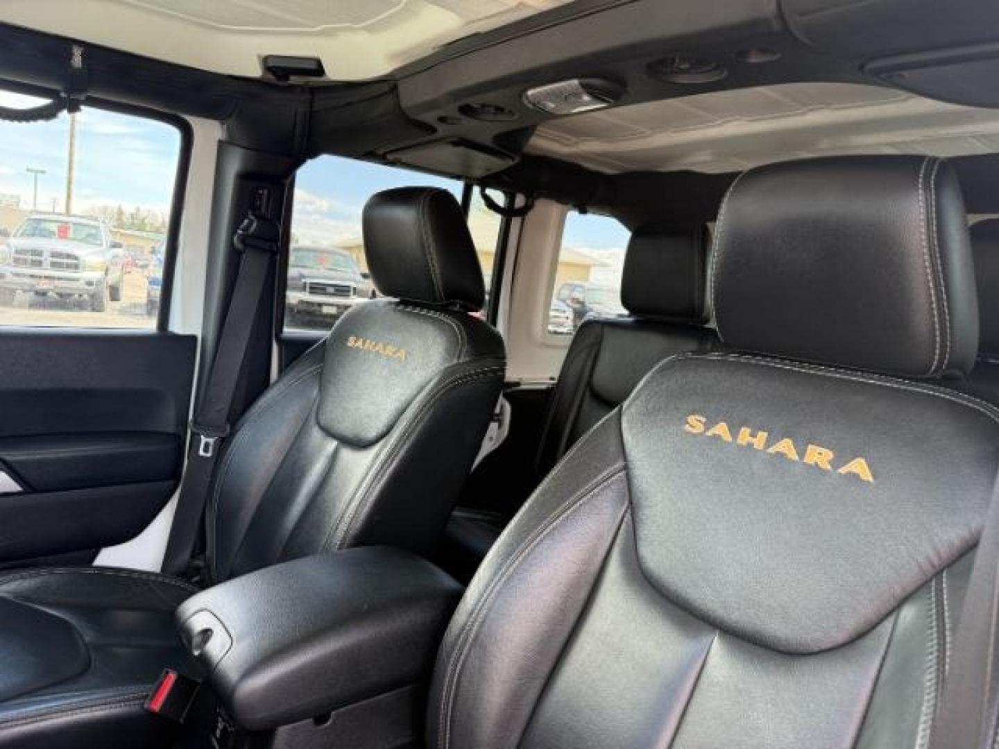 2015 Bright White /Black Jeep Wrangler Unlimited Sahara (1C4BJWEG9FL) with an Pentastar 3.6L V-6 DOHC engine, AUTOMATIC transmission, located at 1235 N Woodruff Ave., Idaho Falls, 83401, (208) 523-1053, 43.507172, -112.000488 - At Timberline Auto, finding a great deal on your next vehicle is always easy! Our experienced sales staff's goal is to help find you the right vehicle at the right price! Our knowledgeable finance department has options for almost any credit score. We offer extended service contract options to prote - Photo#45