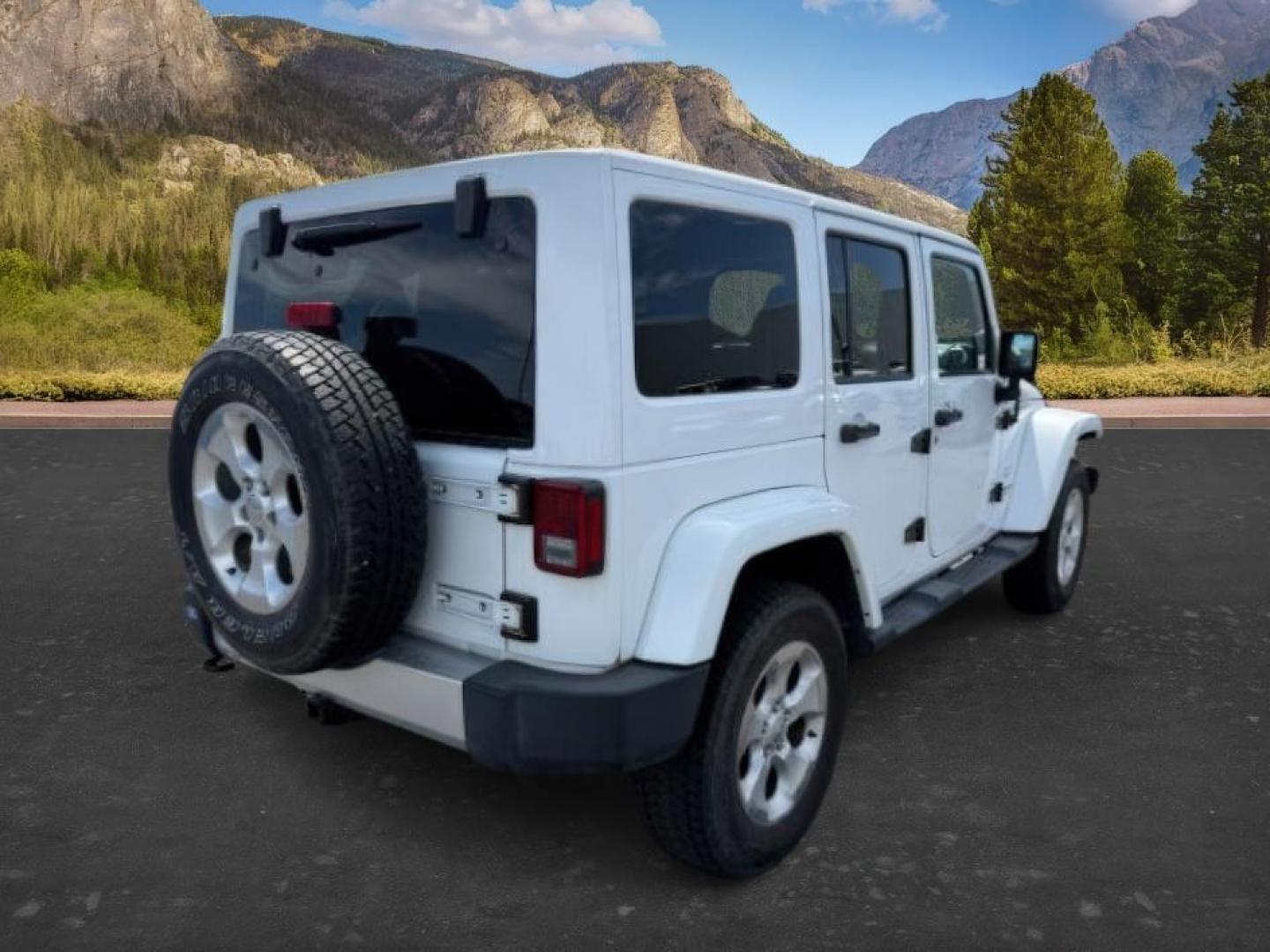 2015 Bright White /Black Jeep Wrangler Unlimited Sahara (1C4BJWEG9FL) with an Pentastar 3.6L V-6 DOHC engine, AUTOMATIC transmission, located at 1235 N Woodruff Ave., Idaho Falls, 83401, (208) 523-1053, 43.507172, -112.000488 - At Timberline Auto, finding a great deal on your next vehicle is always easy! Our experienced sales staff's goal is to help find you the right vehicle at the right price! Our knowledgeable finance department has options for almost any credit score. We offer extended service contract options to prote - Photo#6