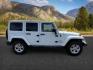 2015 Bright White /Black Jeep Wrangler Unlimited Sahara (1C4BJWEG9FL) with an Pentastar 3.6L V-6 DOHC engine, AUTOMATIC transmission, located at 1235 N Woodruff Ave., Idaho Falls, 83401, (208) 523-1053, 43.507172, -112.000488 - At Timberline Auto, finding a great deal on your next vehicle is always easy! Our experienced sales staff's goal is to help find you the right vehicle at the right price! Our knowledgeable finance department has options for almost any credit score. We offer extended service contract options to prote - Photo#7