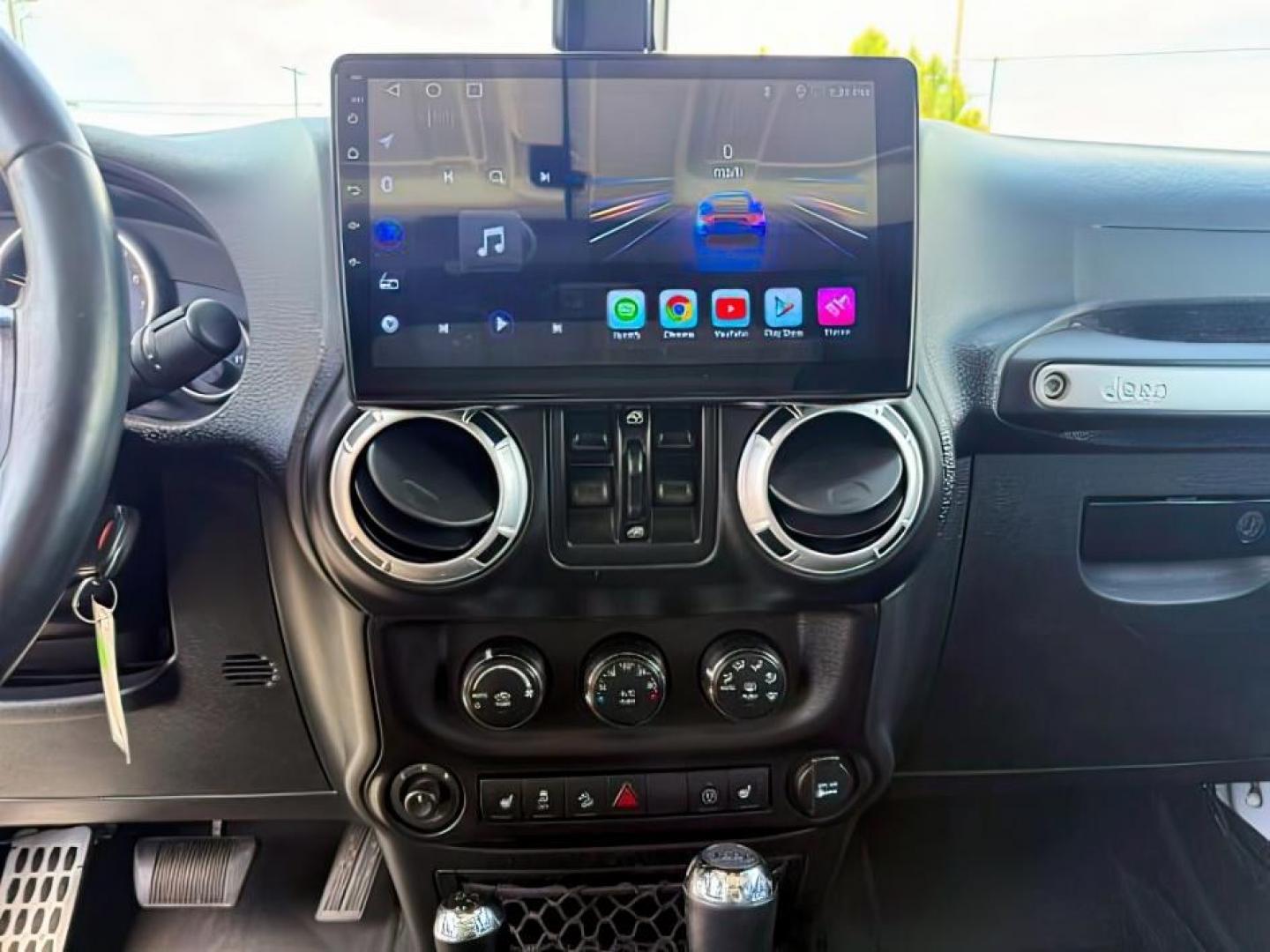 2015 Bright White /Black Jeep Wrangler Unlimited Sahara (1C4BJWEG9FL) with an Pentastar 3.6L V-6 DOHC engine, AUTOMATIC transmission, located at 1235 N Woodruff Ave., Idaho Falls, 83401, (208) 523-1053, 43.507172, -112.000488 - At Timberline Auto, finding a great deal on your next vehicle is always easy! Our experienced sales staff's goal is to help find you the right vehicle at the right price! Our knowledgeable finance department has options for almost any credit score. We offer extended service contract options to prote - Photo#15