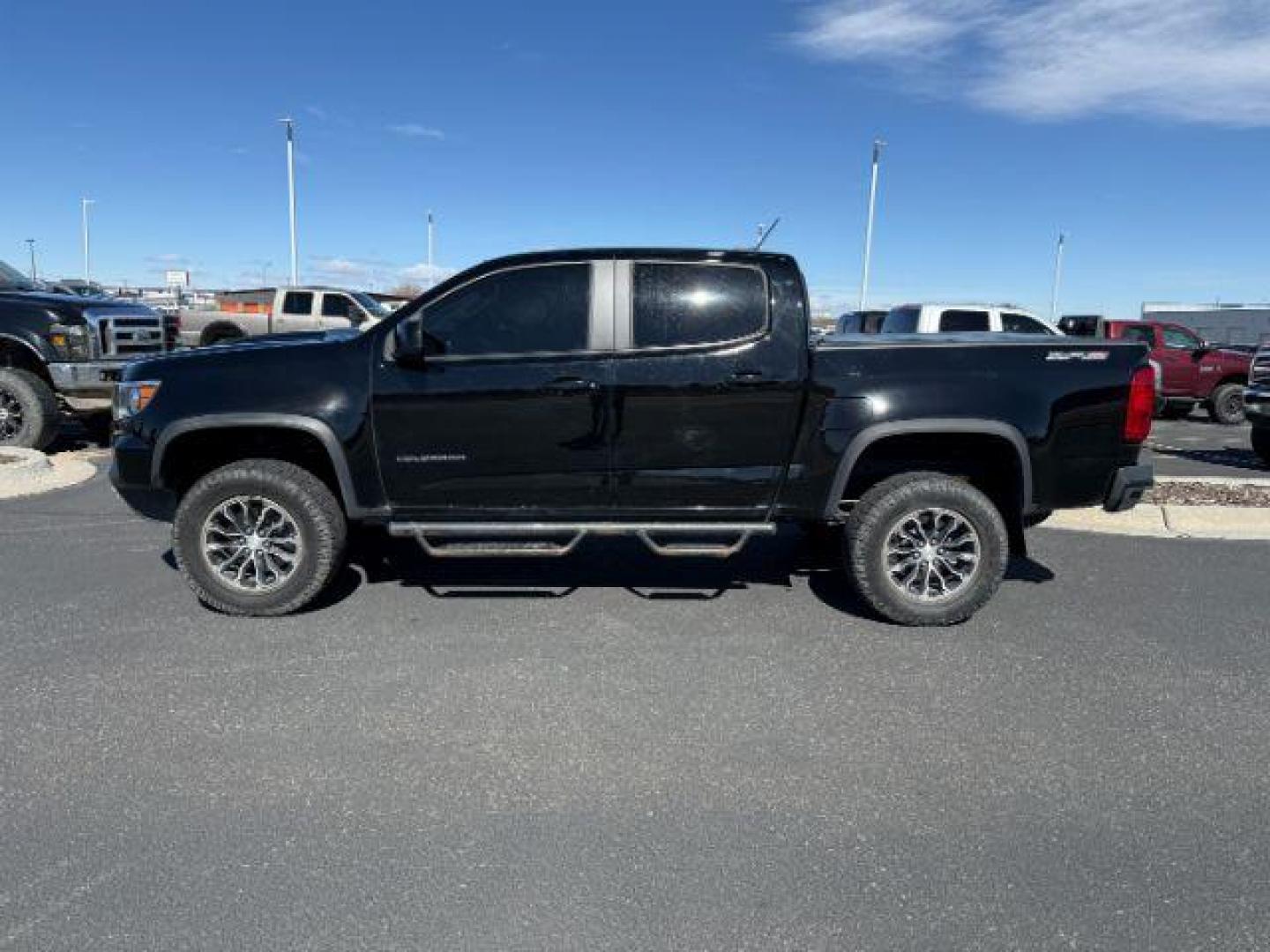 2021 BLACK /LEATHER Chevrolet Colorado (1GCGTEENXM1) with an 36L V-6 gasoline direct injection engine, Automatic transmission, located at 1175 N Woodruff Ave, Idaho Falls, ID, 83401, 43.506901, -111.999657 - At Timberline Auto, finding a great deal on your next vehicle is always easy! Our experienced sales staff's goal is to help find you the right vehicle at the right price! Our knowledgeable finance department has options for almost any credit score. We offer extended service contract options to prote - Photo#1