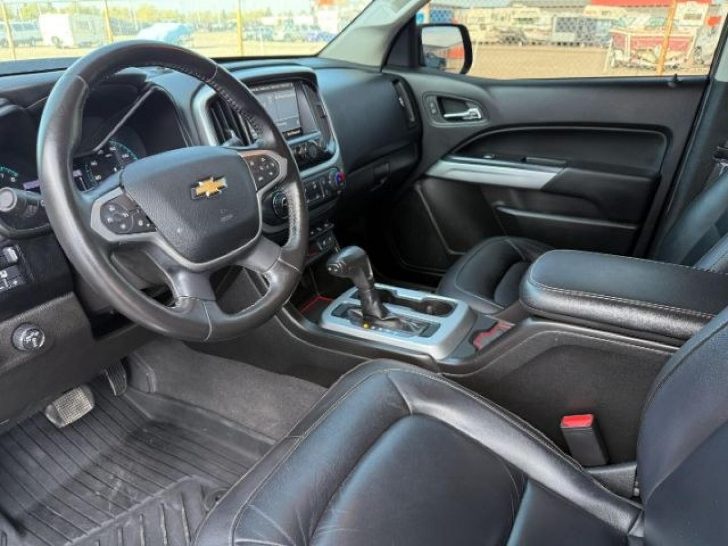 2021 BLACK /LEATHER Chevrolet Colorado (1GCGTEENXM1) with an 36L V-6 gasoline direct injection engine, Automatic transmission, located at 1175 N Woodruff Ave, Idaho Falls, ID, 83401, 43.506901, -111.999657 - At Timberline Auto, finding a great deal on your next vehicle is always easy! Our experienced sales staff's goal is to help find you the right vehicle at the right price! Our knowledgeable finance department has options for almost any credit score. We offer extended service contract options to prote - Photo#42