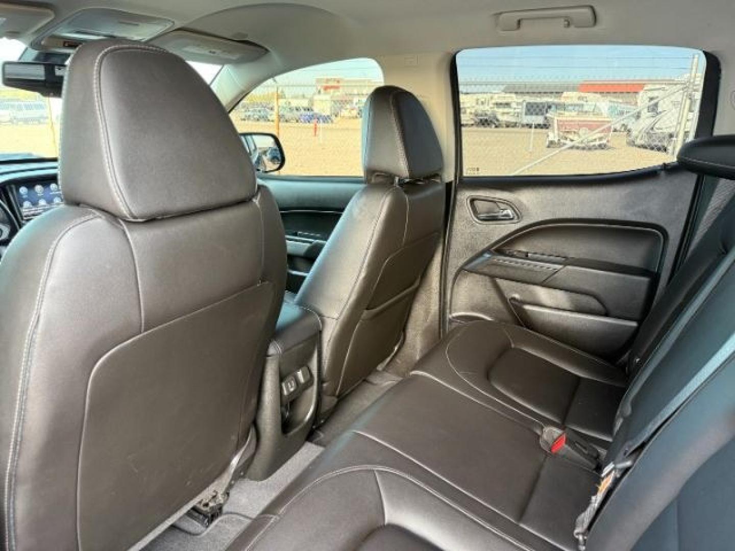 2021 BLACK /LEATHER Chevrolet Colorado (1GCGTEENXM1) with an 36L V-6 gasoline direct injection engine, Automatic transmission, located at 1175 N Woodruff Ave, Idaho Falls, ID, 83401, 43.506901, -111.999657 - At Timberline Auto, finding a great deal on your next vehicle is always easy! Our experienced sales staff's goal is to help find you the right vehicle at the right price! Our knowledgeable finance department has options for almost any credit score. We offer extended service contract options to prote - Photo#54