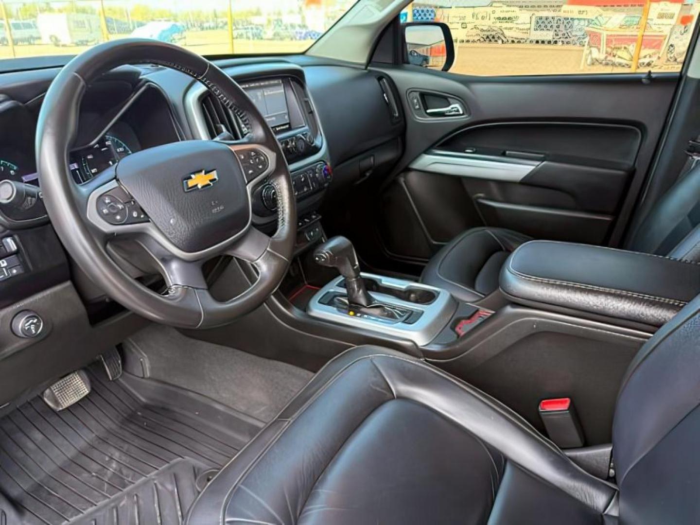 2021 BLACK /LEATHER Chevrolet Colorado (1GCGTEENXM1) with an 36L V-6 gasoline direct injection engine, Automatic transmission, located at 1175 N Woodruff Ave, Idaho Falls, ID, 83401, 43.506901, -111.999657 - At Timberline Auto, finding a great deal on your next vehicle is always easy! Our experienced sales staff's goal is to help find you the right vehicle at the right price! Our knowledgeable finance department has options for almost any credit score. We offer extended service contract options to prote - Photo#14