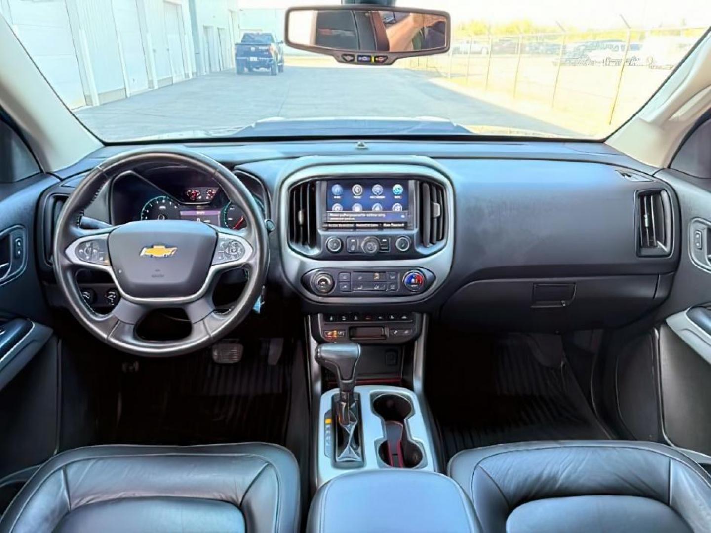 2021 BLACK /LEATHER Chevrolet Colorado (1GCGTEENXM1) with an 36L V-6 gasoline direct injection engine, Automatic transmission, located at 1175 N Woodruff Ave, Idaho Falls, ID, 83401, 43.506901, -111.999657 - At Timberline Auto, finding a great deal on your next vehicle is always easy! Our experienced sales staff's goal is to help find you the right vehicle at the right price! Our knowledgeable finance department has options for almost any credit score. We offer extended service contract options to prote - Photo#25