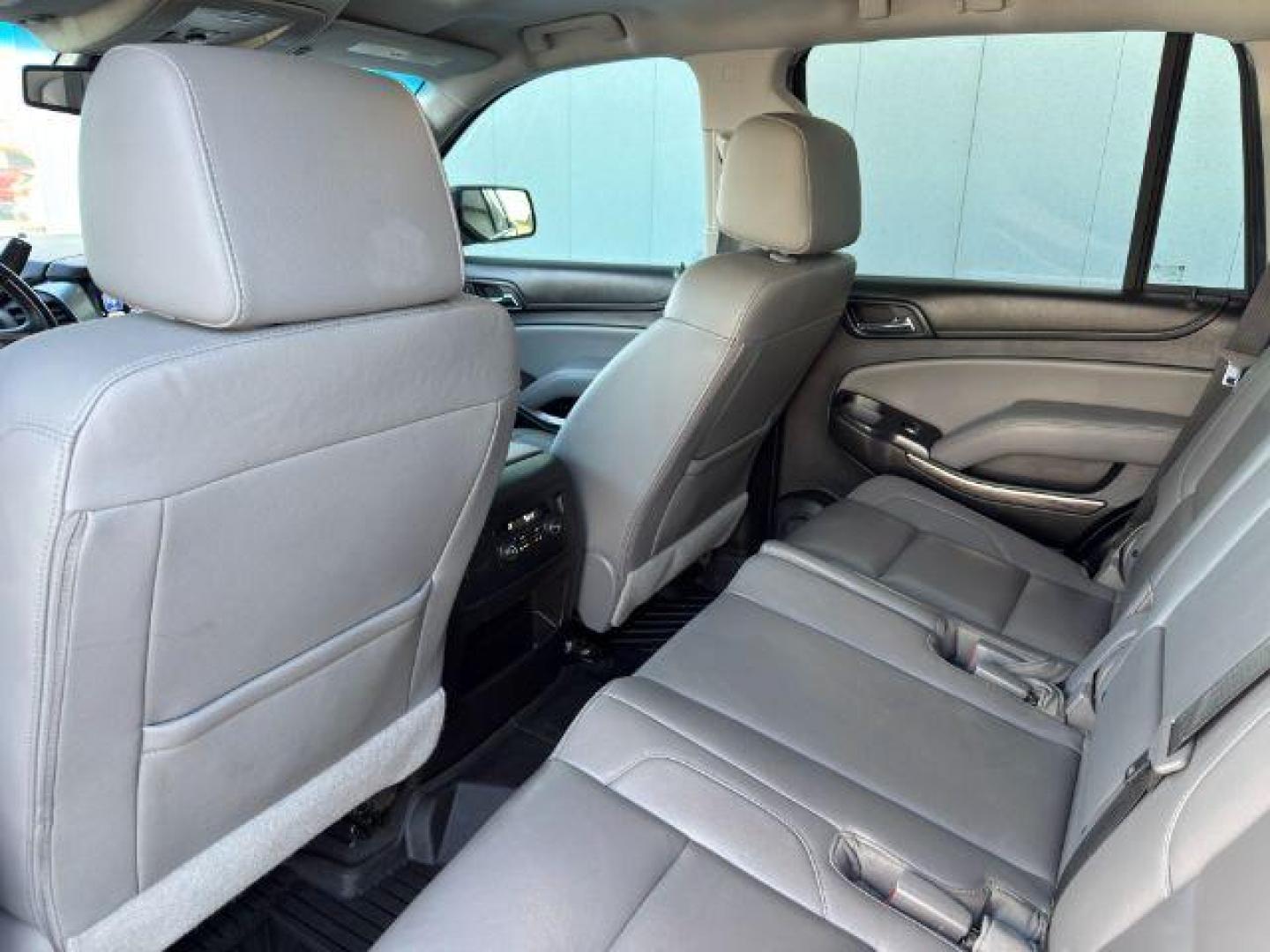 2018 GRAY /Jet Black Chevrolet Tahoe (1GNSKBKCXJR) with an EcoTec3 53L V-8 gasoline direct injection engine, Automatic transmission, located at 1175 N Woodruff Ave, Idaho Falls, ID, 83401, 43.506901, -111.999657 - Photo#56