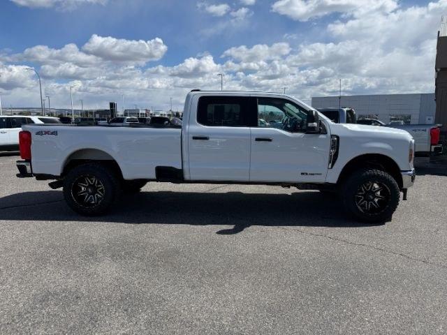 2024 WHITE /Medium Dark Slate Ford F-350 XLT (1FT8W3BT0RE) with an Powerstroke 6.7L V-8 diesel direct injection engine, AUTOMATIC transmission, located at 1235 N Woodruff Ave., Idaho Falls, 83401, (208) 523-1053, 43.507172, -112.000488 - At Timberline Auto, finding a great deal on your next vehicle is always easy! Our experienced sales staff's goal is to help find you the right vehicle at the right price! Our knowledgeable finance department has options for almost any credit score. We offer extended service contract options to prote- Photo#37