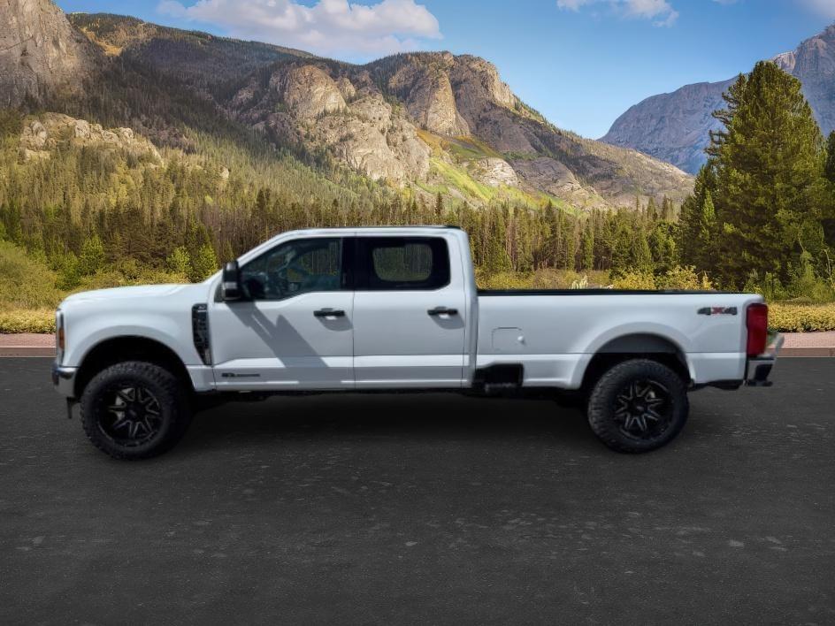 2024 WHITE /Medium Dark Slate Ford F-350 XLT (1FT8W3BT0RE) with an Powerstroke 6.7L V-8 diesel direct injection engine, AUTOMATIC transmission, located at 1235 N Woodruff Ave., Idaho Falls, 83401, (208) 523-1053, 43.507172, -112.000488 - At Timberline Auto, finding a great deal on your next vehicle is always easy! Our experienced sales staff's goal is to help find you the right vehicle at the right price! Our knowledgeable finance department has options for almost any credit score. We offer extended service contract options to prote- Photo#1