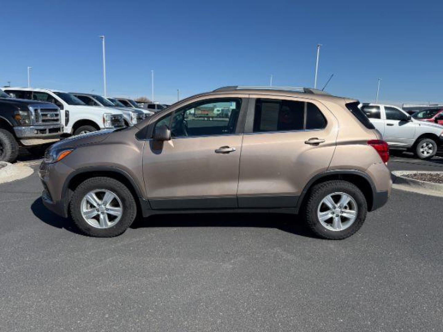2018 GOLD /CLOTH Chevrolet Trax (3GNCJPSB4JL) with an 14L I4 TURBO engine, Automatic transmission, located at 1175 N Woodruff Ave, Idaho Falls, ID, 83401, 43.506901, -111.999657 - At Timberline Auto, finding a great deal on your next vehicle is always easy! Our experienced sales staff's goal is to help find you the right vehicle at the right price! Our knowledgeable finance department has options for almost any credit score. We offer extended service contract options to prote - Photo#1