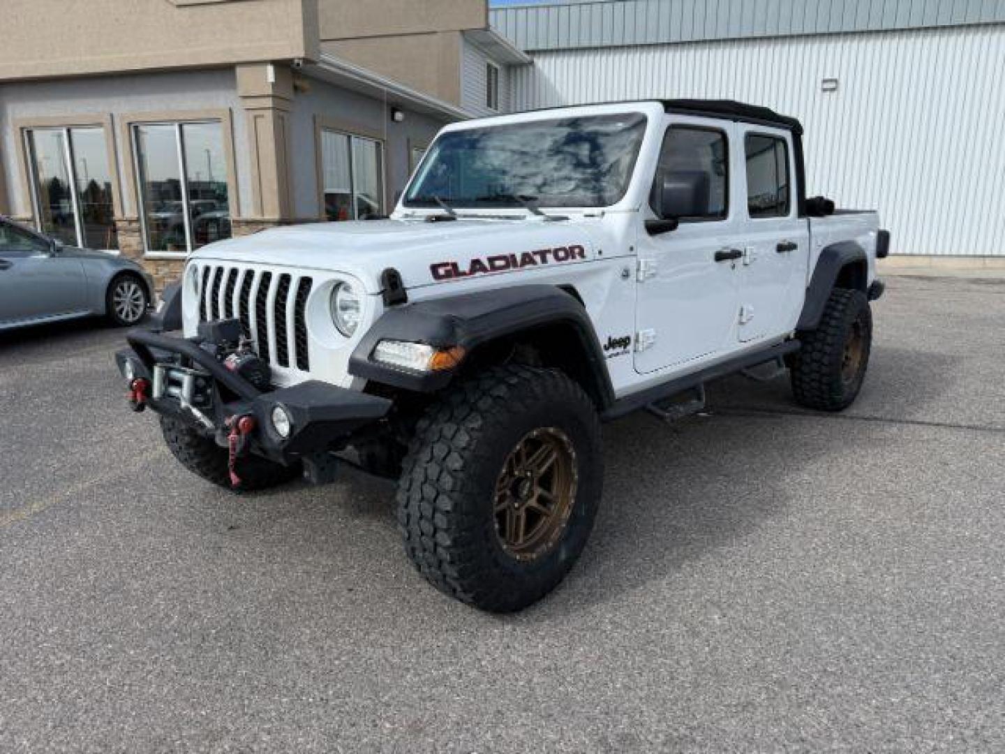 2020 WHITE /Black Jeep Gladiator Sport S 4x4 (1C6HJTAG9LL) with an 3.6L V-6 DOHC engine, AUTOMATIC transmission, located at 1235 N Woodruff Ave., Idaho Falls, 83401, (208) 523-1053, 43.507172, -112.000488 - At Timberline Auto, finding a great deal on your next vehicle is always easy! Our experienced sales staff's goal is to help find you the right vehicle at the right price! Our knowledgeable finance department has options for almost any credit score. We offer extended service contract options to prote - Photo#25
