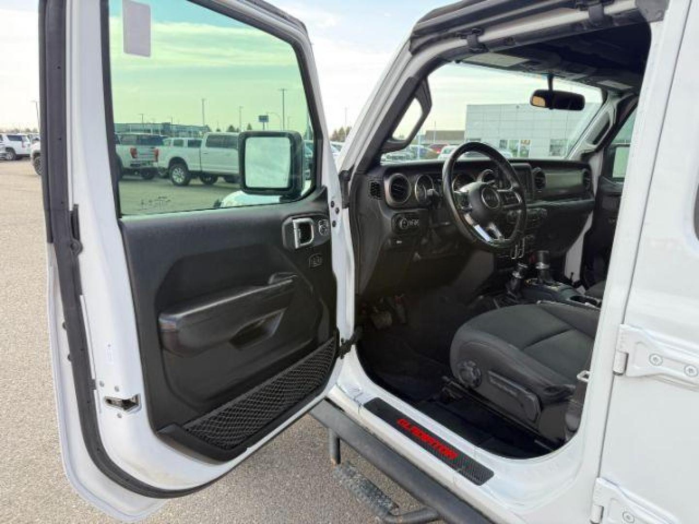 2020 WHITE /Black Jeep Gladiator Sport S 4x4 (1C6HJTAG9LL) with an 3.6L V-6 DOHC engine, AUTOMATIC transmission, located at 1235 N Woodruff Ave., Idaho Falls, 83401, (208) 523-1053, 43.507172, -112.000488 - At Timberline Auto, finding a great deal on your next vehicle is always easy! Our experienced sales staff's goal is to help find you the right vehicle at the right price! Our knowledgeable finance department has options for almost any credit score. We offer extended service contract options to prote - Photo#37