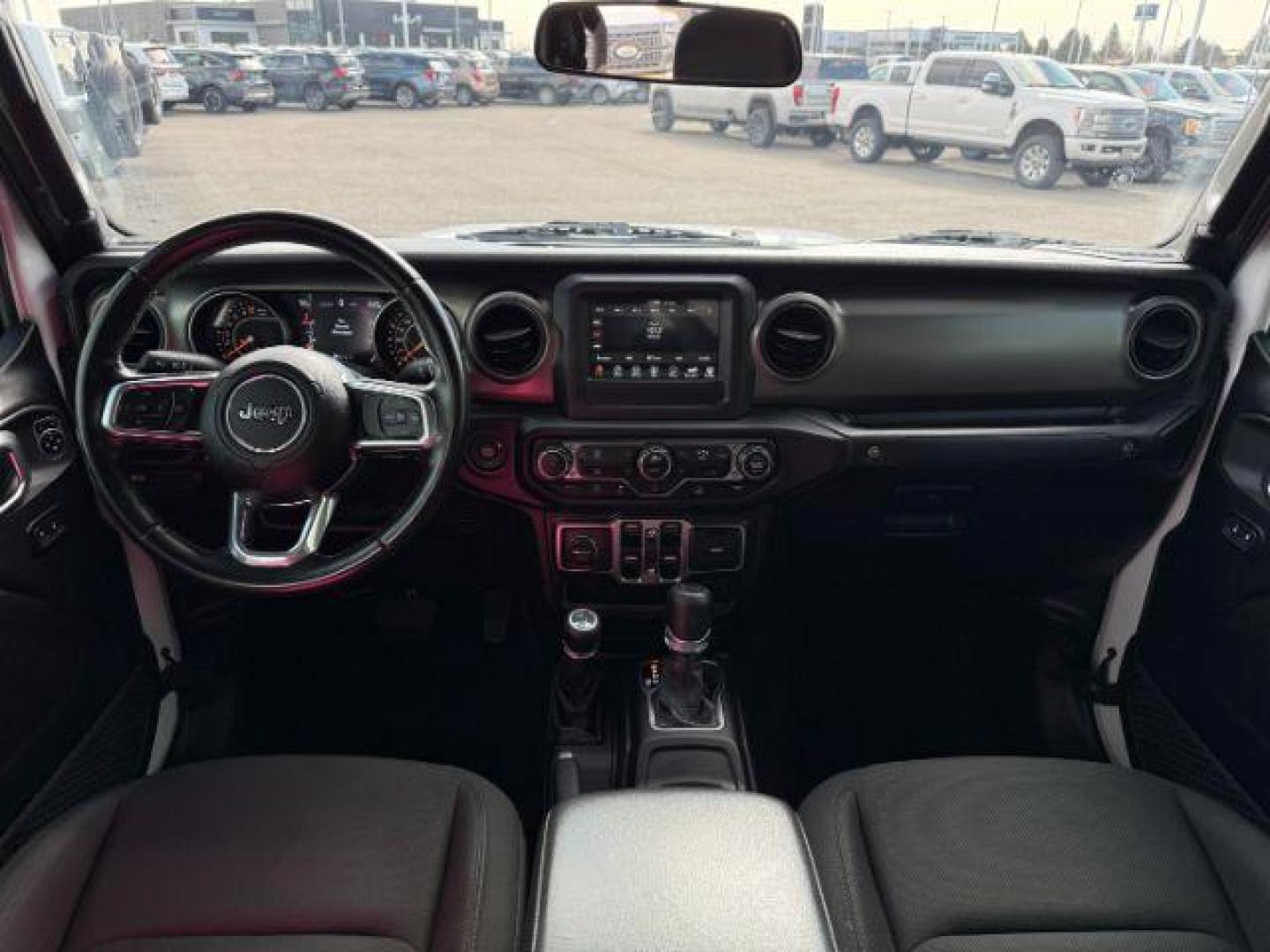 2020 WHITE /Black Jeep Gladiator Sport S 4x4 (1C6HJTAG9LL) with an 3.6L V-6 DOHC engine, AUTOMATIC transmission, located at 1235 N Woodruff Ave., Idaho Falls, 83401, (208) 523-1053, 43.507172, -112.000488 - At Timberline Auto, finding a great deal on your next vehicle is always easy! Our experienced sales staff's goal is to help find you the right vehicle at the right price! Our knowledgeable finance department has options for almost any credit score. We offer extended service contract options to prote - Photo#46