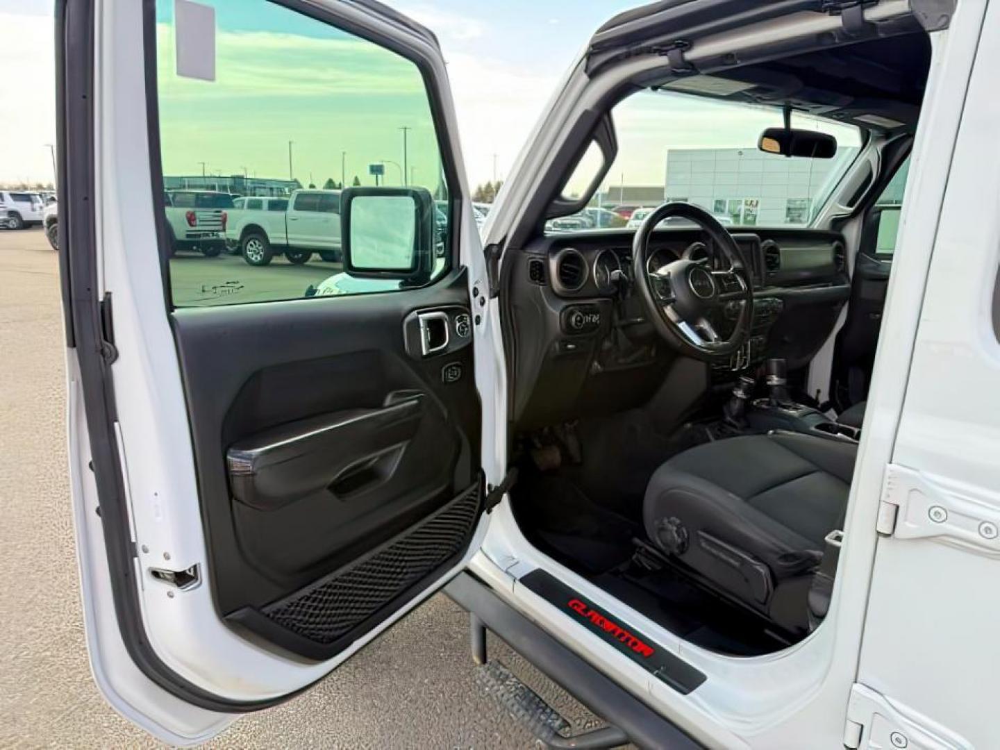 2020 WHITE /Black Jeep Gladiator Sport S 4x4 (1C6HJTAG9LL) with an 3.6L V-6 DOHC engine, AUTOMATIC transmission, located at 1235 N Woodruff Ave., Idaho Falls, 83401, (208) 523-1053, 43.507172, -112.000488 - At Timberline Auto, finding a great deal on your next vehicle is always easy! Our experienced sales staff's goal is to help find you the right vehicle at the right price! Our knowledgeable finance department has options for almost any credit score. We offer extended service contract options to prote - Photo#12
