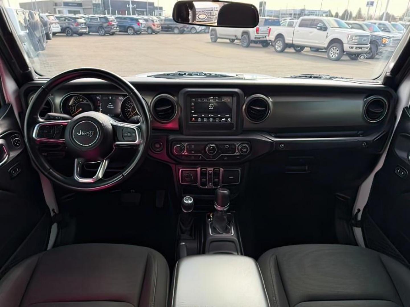 2020 WHITE /Black Jeep Gladiator Sport S 4x4 (1C6HJTAG9LL) with an 3.6L V-6 DOHC engine, AUTOMATIC transmission, located at 1235 N Woodruff Ave., Idaho Falls, 83401, (208) 523-1053, 43.507172, -112.000488 - At Timberline Auto, finding a great deal on your next vehicle is always easy! Our experienced sales staff's goal is to help find you the right vehicle at the right price! Our knowledgeable finance department has options for almost any credit score. We offer extended service contract options to prote - Photo#21