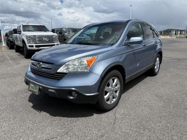 2007 BLUE /Black Honda CR-V EX-L (JHLRE48757C) with an 2.4L I-4 DOHC engine, AUTOMATIC transmission, located at 1235 N Woodruff Ave., Idaho Falls, 83401, (208) 523-1053, 43.507172, -112.000488 - This 2007 Honda CR-V is a practical compact SUV built for dependable daily use and flexible cargo hauling. Powered by a 2.4L I4 engine, it delivers consistent performance with efficient operation for commuting, errands, and longer drives. AWD capability adds confidence in changing road conditions, m- Photo#25