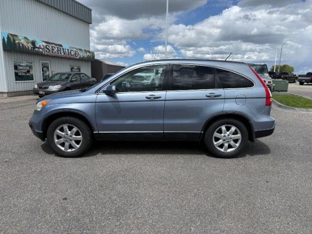 2007 BLUE /Black Honda CR-V EX-L (JHLRE48757C) with an 2.4L I-4 DOHC engine, AUTOMATIC transmission, located at 1235 N Woodruff Ave., Idaho Falls, 83401, (208) 523-1053, 43.507172, -112.000488 - This 2007 Honda CR-V is a practical compact SUV built for dependable daily use and flexible cargo hauling. Powered by a 2.4L I4 engine, it delivers consistent performance with efficient operation for commuting, errands, and longer drives. AWD capability adds confidence in changing road conditions, m- Photo#26