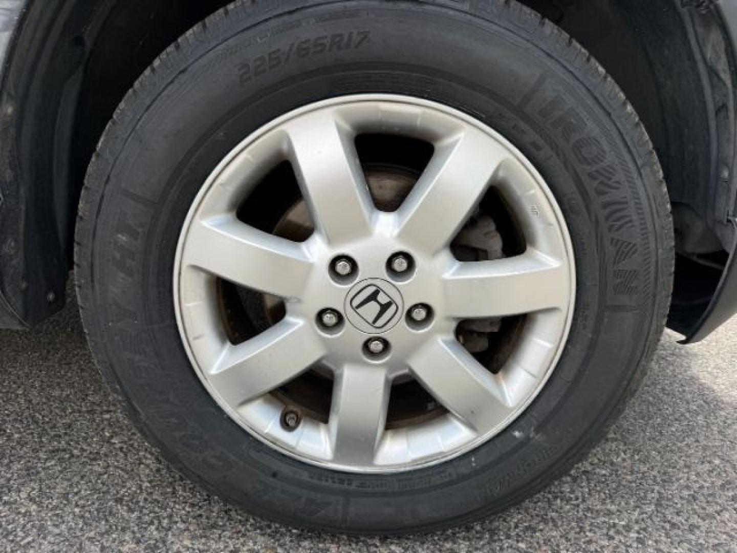 2007 BLUE /Black Honda CR-V EX-L (JHLRE48757C) with an 2.4L I-4 DOHC engine, AUTOMATIC transmission, located at 1235 N Woodruff Ave., Idaho Falls, 83401, (208) 523-1053, 43.507172, -112.000488 - At Timberline Auto, finding a great deal on your next vehicle is always easy! Our experienced sales staff's goal is to help find you the right vehicle at the right price! Our knowledgeable finance department has options for almost any credit score. We offer extended service contract options to prote - Photo#35