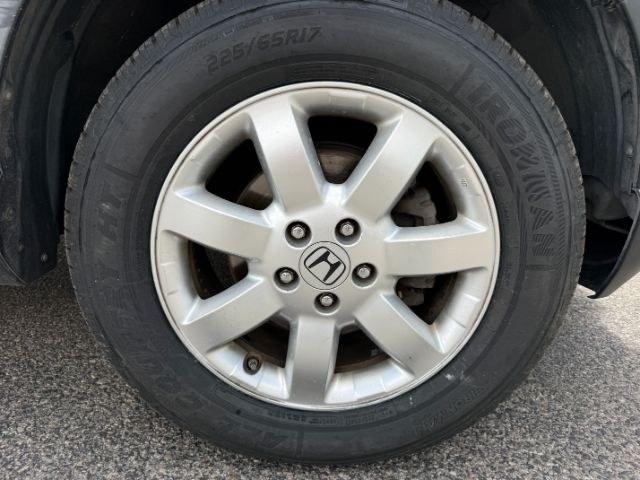 2007 BLUE /Black Honda CR-V EX-L (JHLRE48757C) with an 2.4L I-4 DOHC engine, AUTOMATIC transmission, located at 1235 N Woodruff Ave., Idaho Falls, 83401, (208) 523-1053, 43.507172, -112.000488 - This 2007 Honda CR-V is a practical compact SUV built for dependable daily use and flexible cargo hauling. Powered by a 2.4L I4 engine, it delivers consistent performance with efficient operation for commuting, errands, and longer drives. AWD capability adds confidence in changing road conditions, m- Photo#35