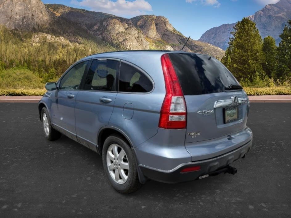 2007 BLUE /Black Honda CR-V EX-L (JHLRE48757C) with an 2.4L I-4 DOHC engine, AUTOMATIC transmission, located at 1235 N Woodruff Ave., Idaho Falls, 83401, (208) 523-1053, 43.507172, -112.000488 - This 2007 Honda CR-V is a practical compact SUV built for dependable daily use and flexible cargo hauling. Powered by a 2.4L I4 engine, it delivers consistent performance with efficient operation for commuting, errands, and longer drives. AWD capability adds confidence in changing road conditions, m- Photo#2