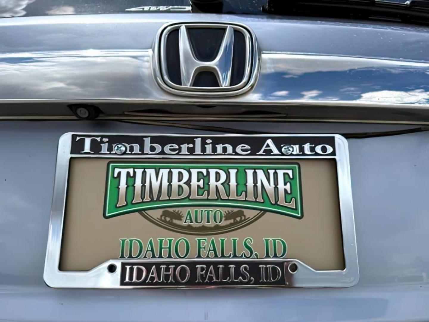 2007 BLUE /Black Honda CR-V EX-L (JHLRE48757C) with an 2.4L I-4 DOHC engine, AUTOMATIC transmission, located at 1235 N Woodruff Ave., Idaho Falls, 83401, (208) 523-1053, 43.507172, -112.000488 - At Timberline Auto, finding a great deal on your next vehicle is always easy! Our experienced sales staff's goal is to help find you the right vehicle at the right price! Our knowledgeable finance department has options for almost any credit score. We offer extended service contract options to prote - Photo#4