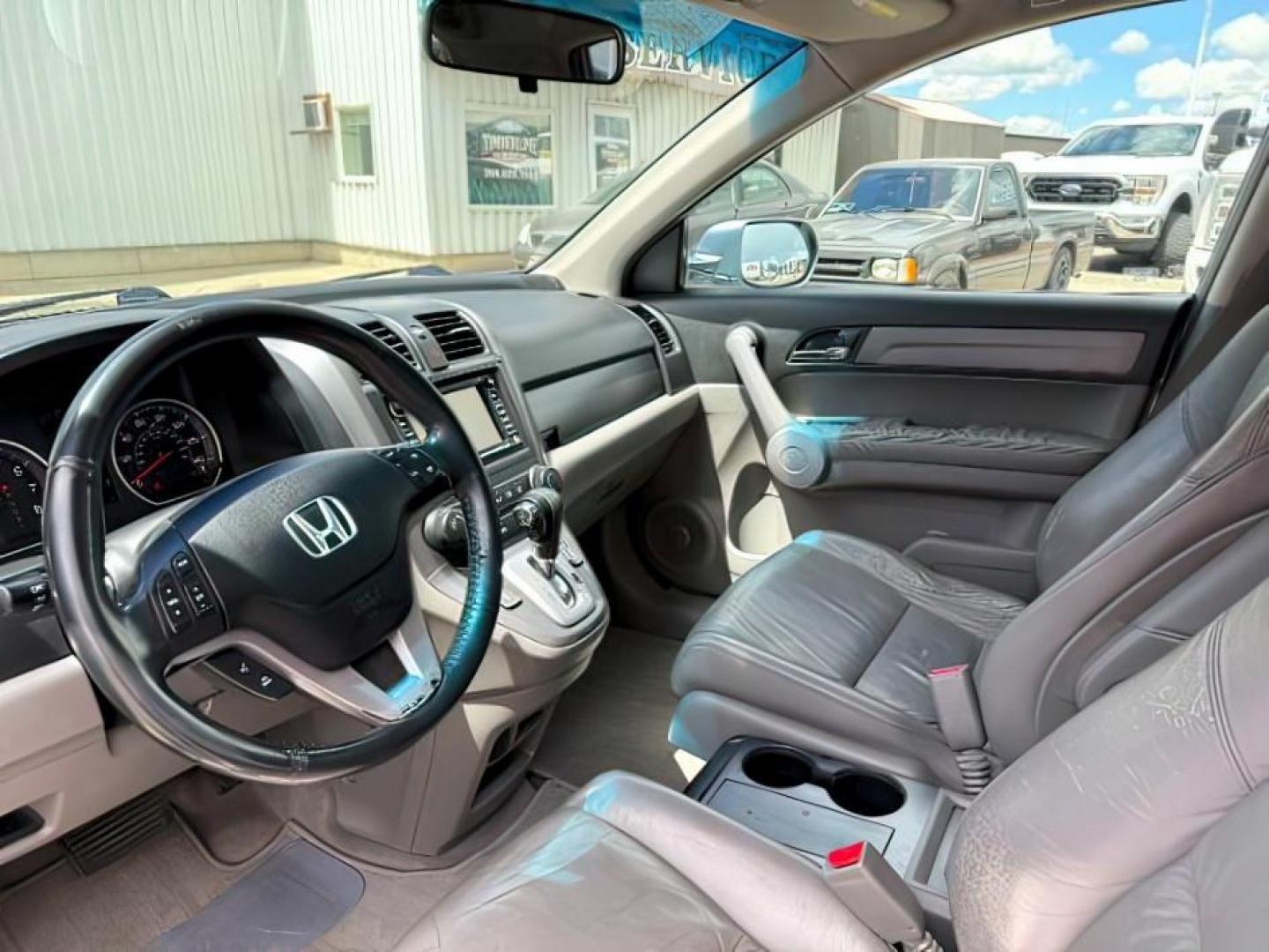 2007 BLUE /Black Honda CR-V EX-L (JHLRE48757C) with an 2.4L I-4 DOHC engine, AUTOMATIC transmission, located at 1235 N Woodruff Ave., Idaho Falls, 83401, (208) 523-1053, 43.507172, -112.000488 - At Timberline Auto, finding a great deal on your next vehicle is always easy! Our experienced sales staff's goal is to help find you the right vehicle at the right price! Our knowledgeable finance department has options for almost any credit score. We offer extended service contract options to prote - Photo#13