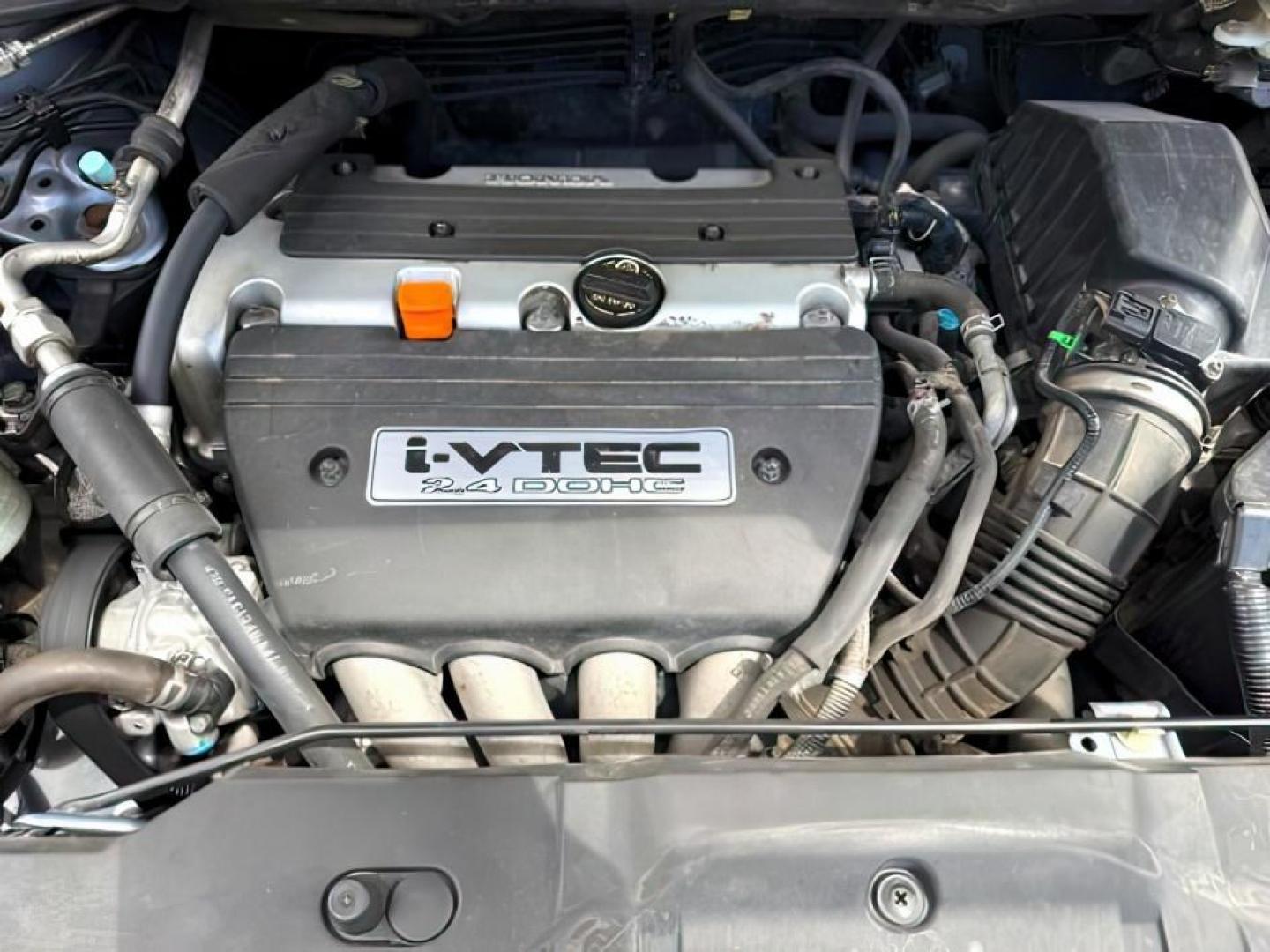 2007 BLUE /Black Honda CR-V EX-L (JHLRE48757C) with an 2.4L I-4 DOHC engine, AUTOMATIC transmission, located at 1235 N Woodruff Ave., Idaho Falls, 83401, (208) 523-1053, 43.507172, -112.000488 - At Timberline Auto, finding a great deal on your next vehicle is always easy! Our experienced sales staff's goal is to help find you the right vehicle at the right price! Our knowledgeable finance department has options for almost any credit score. We offer extended service contract options to prote - Photo#24