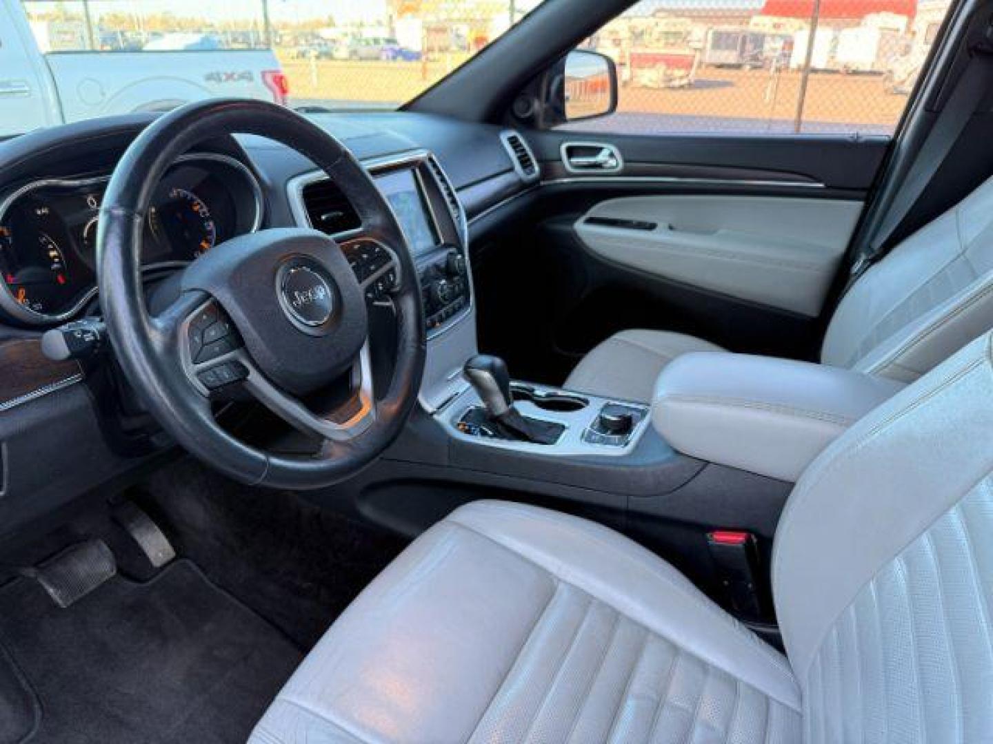2018 BLACK /Black Jeep Grand Cherokee (1C4RJFBG2JC) with an Pentastar 36L V-6 DOHC engine, Automatic transmission, located at 1175 N Woodruff Ave, Idaho Falls, ID, 83401, 43.506901, -111.999657 - At Timberline Auto, finding a great deal on your next vehicle is always easy! Our experienced sales staff's goal is to help find you the right vehicle at the right price! Our knowledgeable finance department has options for almost any credit score. We offer extended service contract options to prote - Photo#16