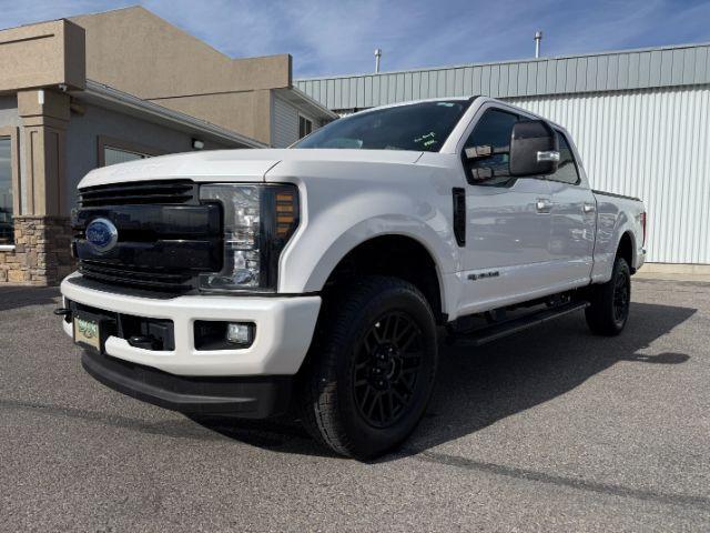 2019 WHITE /Black Ford F-250 LARIAT (1FT7W2BT2KE) with an Powerstroke 6.7L V-8 diesel direct injection engine, AUTOMATIC transmission, located at 1235 N Woodruff Ave., Idaho Falls, 83401, (208) 523-1053, 43.507172, -112.000488 - Clean, confident, and built with purpose, this 2019 Ford F-250 Super Duty brings serious diesel strength with its 6.7L Power Stroke under the hood, ready for demanding towing and heavy hauling. The bed cover adds secure, weather-protected storage that keeps gear and tools locked down and organized,- Photo#28