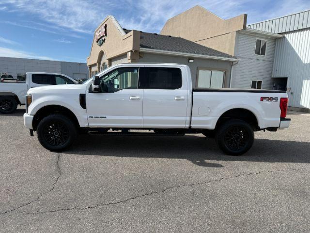 2019 WHITE /Black Ford F-250 LARIAT (1FT7W2BT2KE) with an Powerstroke 6.7L V-8 diesel direct injection engine, AUTOMATIC transmission, located at 1235 N Woodruff Ave., Idaho Falls, 83401, (208) 523-1053, 43.507172, -112.000488 - Clean, confident, and built with purpose, this 2019 Ford F-250 Super Duty brings serious diesel strength with its 6.7L Power Stroke under the hood, ready for demanding towing and heavy hauling. The bed cover adds secure, weather-protected storage that keeps gear and tools locked down and organized,- Photo#29