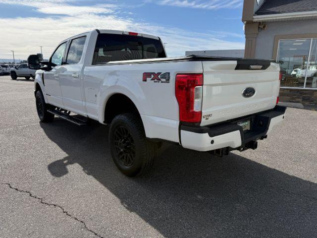 2019 WHITE /Black Ford F-250 LARIAT (1FT7W2BT2KE) with an Powerstroke 6.7L V-8 diesel direct injection engine, AUTOMATIC transmission, located at 1235 N Woodruff Ave., Idaho Falls, 83401, (208) 523-1053, 43.507172, -112.000488 - Clean, confident, and built with purpose, this 2019 Ford F-250 Super Duty brings serious diesel strength with its 6.7L Power Stroke under the hood, ready for demanding towing and heavy hauling. The bed cover adds secure, weather-protected storage that keeps gear and tools locked down and organized,- Photo#30