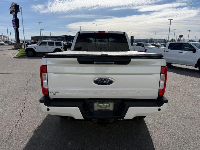 2019 WHITE /Black Ford F-250 LARIAT (1FT7W2BT2KE) with an Powerstroke 6.7L V-8 diesel direct injection engine, AUTOMATIC transmission, located at 1235 N Woodruff Ave., Idaho Falls, 83401, (208) 523-1053, 43.507172, -112.000488 - Clean, confident, and built with purpose, this 2019 Ford F-250 Super Duty brings serious diesel strength with its 6.7L Power Stroke under the hood, ready for demanding towing and heavy hauling. The bed cover adds secure, weather-protected storage that keeps gear and tools locked down and organized,- Photo#31